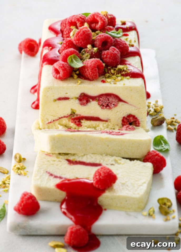 Velvet Raspberry Pistachio Semifreddo 8 Beautifully sliced Raspberry Pistachio Semifreddo with raspberry puree and pistachio garnish