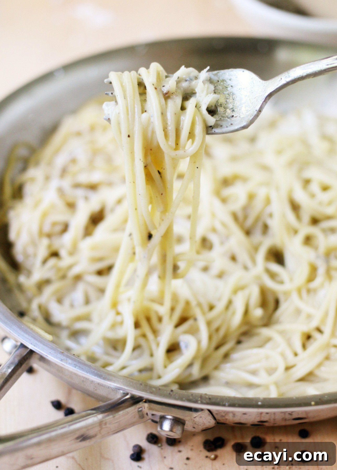 Master Weeknights: 21 Authentic Italian Pasta Dishes, Made Simple 3 One-Pot Cacio e Pepe Pasta by Food Nouveau, showing a plate of creamy pasta.