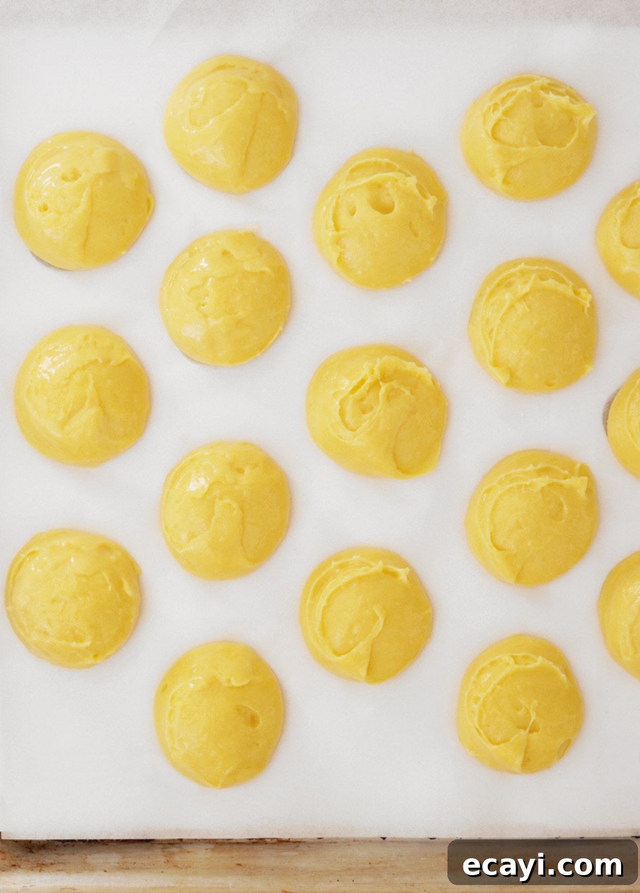 Cookie scoop used to create perfectly uniform mounds of choux pastry dough.