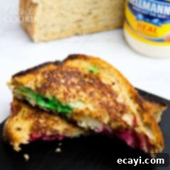 Holiday Comfort Melt 8 A sandwich cut in half