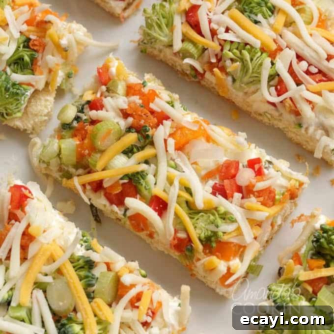 Thirty Irresistible Appetizer Recipes 8 fresh veggies and cheese on cream cheese and crescent dough