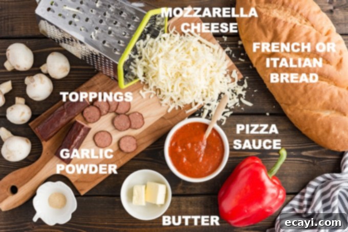 Fresh ingredients like French bread, cheese, and sauce ready for homemade pizza. #ingredients #pizzarecipe #cookathome Assortment of fresh ingredients laid out for making French bread pizza