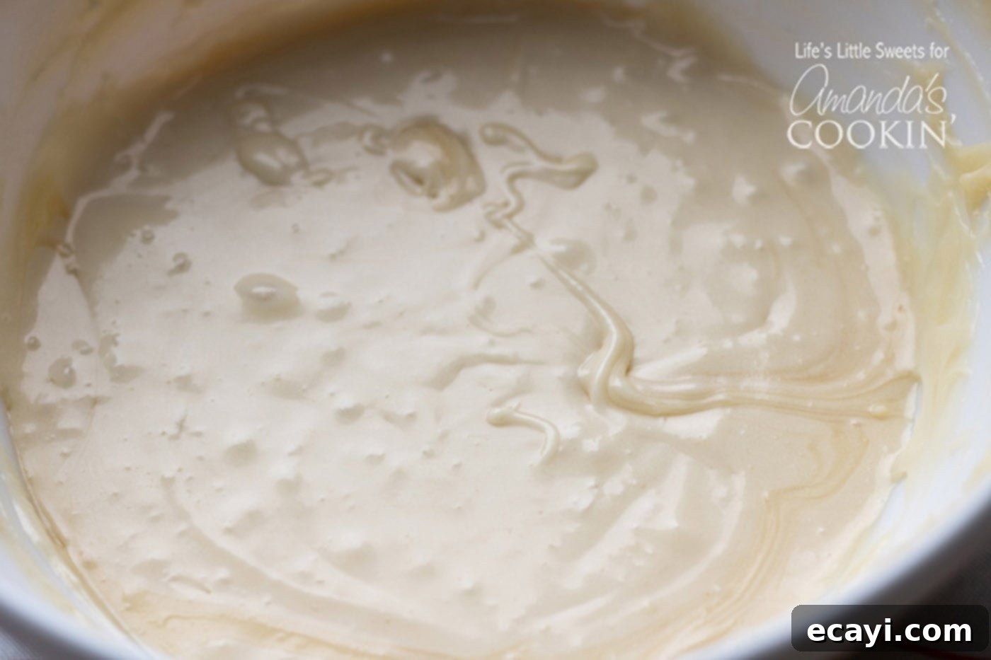 Sweet Cinnamon Comfort Rolls 8 Bowl of fluffy cream cheese frosting