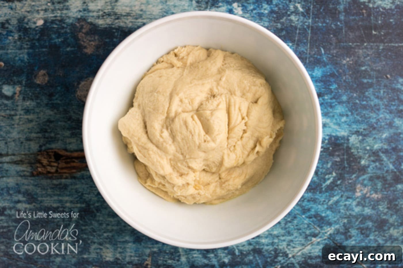 Sweet Cinnamon Comfort Rolls 2 Homemade Cinnamon Roll dough in a bowl, after rising