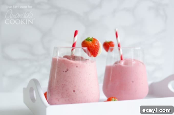 Treat your friends, family, or yourself to this delicious and easy-to-make strawberry banana smoothie strawberry banana smoothies with strawberry garnish