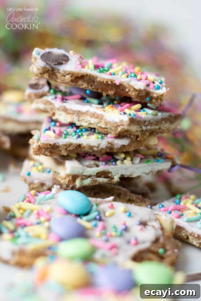 This Easter crack is a festive Saltine Toffee. An easy-to-make recipe using simple pantry ingredients like white chocolate, sprinkles, and Easter candies. #easterdessert #easter #eastercandy #saltinetoffee #saltinecrack #whitechocolate #holidaydessert Easter crack for spring and Easter