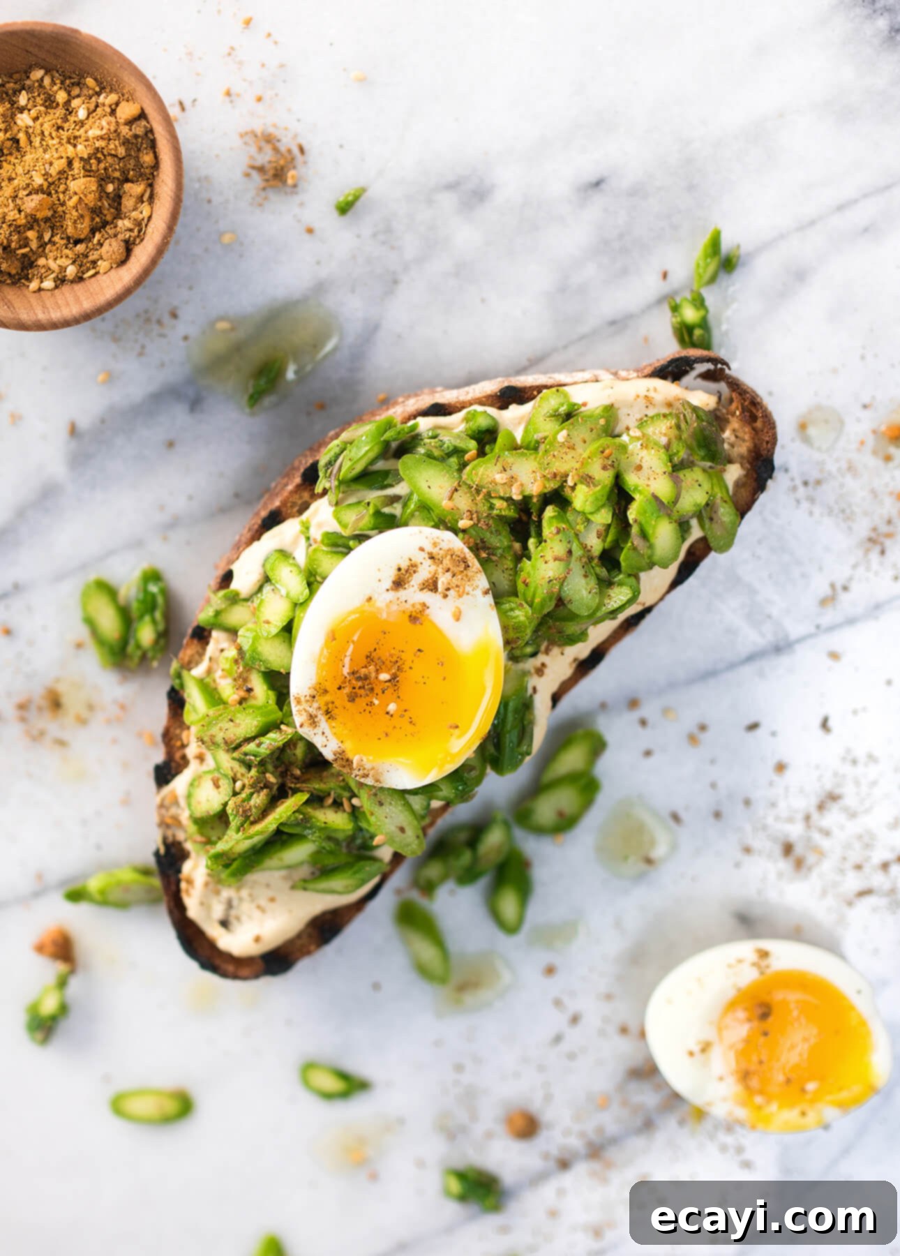 12 Must-Try Savory Egg Brunch Recipes 10 Dukkah, Soft-Boiled Egg, and Fresh Asparagus Tartine // FoodNouveau.com