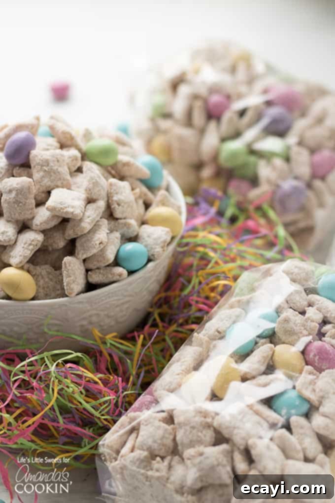 Easter Muddy Buddies are a sweet and salty snack with cereal. Then coated in white chocolate & peanut butter, customized with your favorite Easter candies. #snack #easter #easterdessert #easterrecipes #muddybuddy #puppychow #candy #chexmix #whitechocolate Easter Muddy Buddies