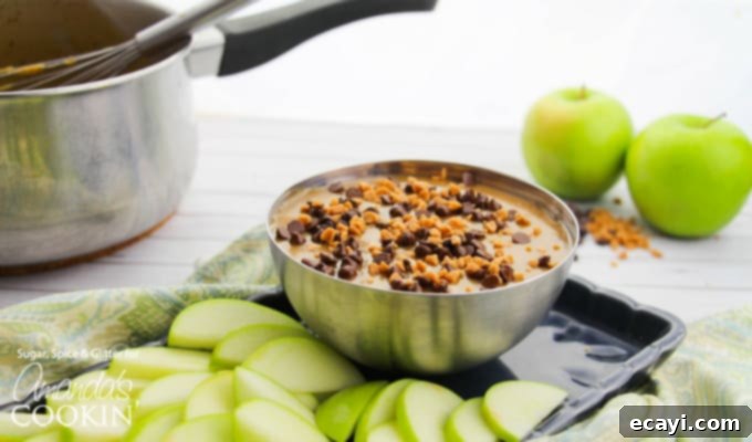 Luscious Caramel Apple Treat 5 Artistic flat lay of homemade caramel apple dip with fresh apple slices, emphasizing its easy, sweet, creamy, and soft caramel sauce qualities.