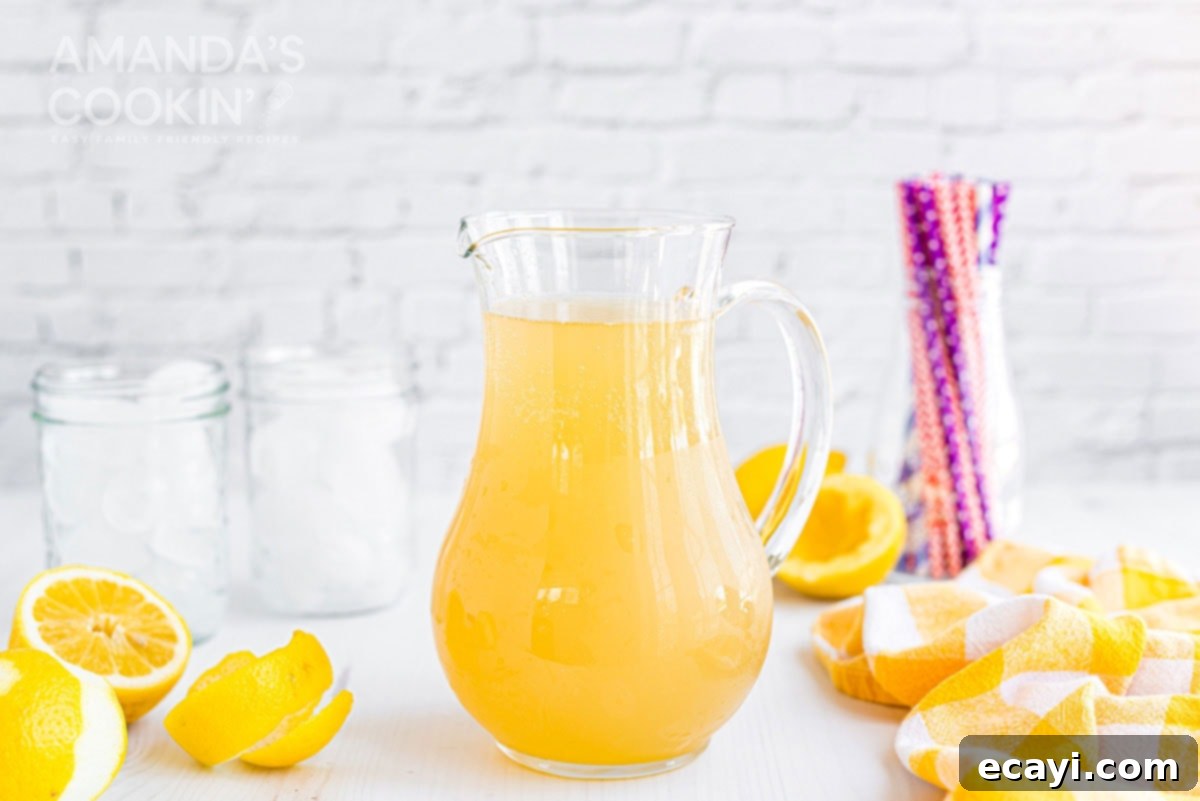 Leave the lemonade for the kids and mix up this Lynchburg Lemonade for your next BBQ - a Jack Daniels-spiked lemon cocktail that is surprisingly smooth. A full pitcher of Lynchburg lemonade with lemon slices and ice, ready to be served