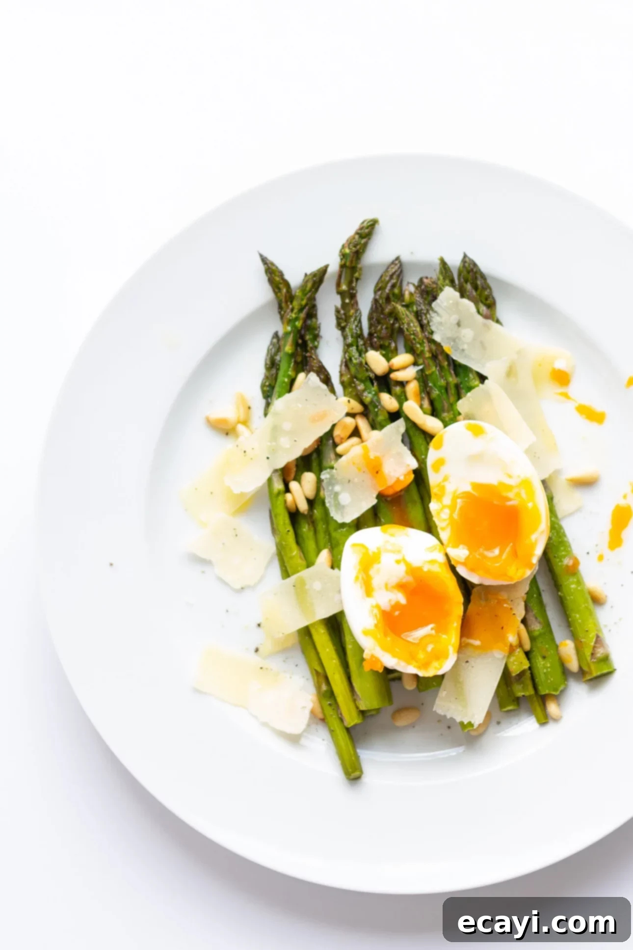 Spring's Bounty: 30 Asparagus Delights 4 Warm Roasted Asparagus Salad with Soft-Boiled Egg, Parmesan, and Pine Nuts