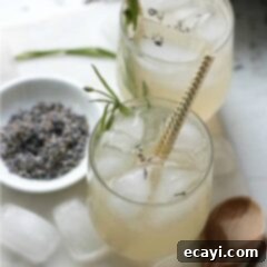 Lavender Lemon Infusion 2 overhead view of lavender lemonade with gold straws