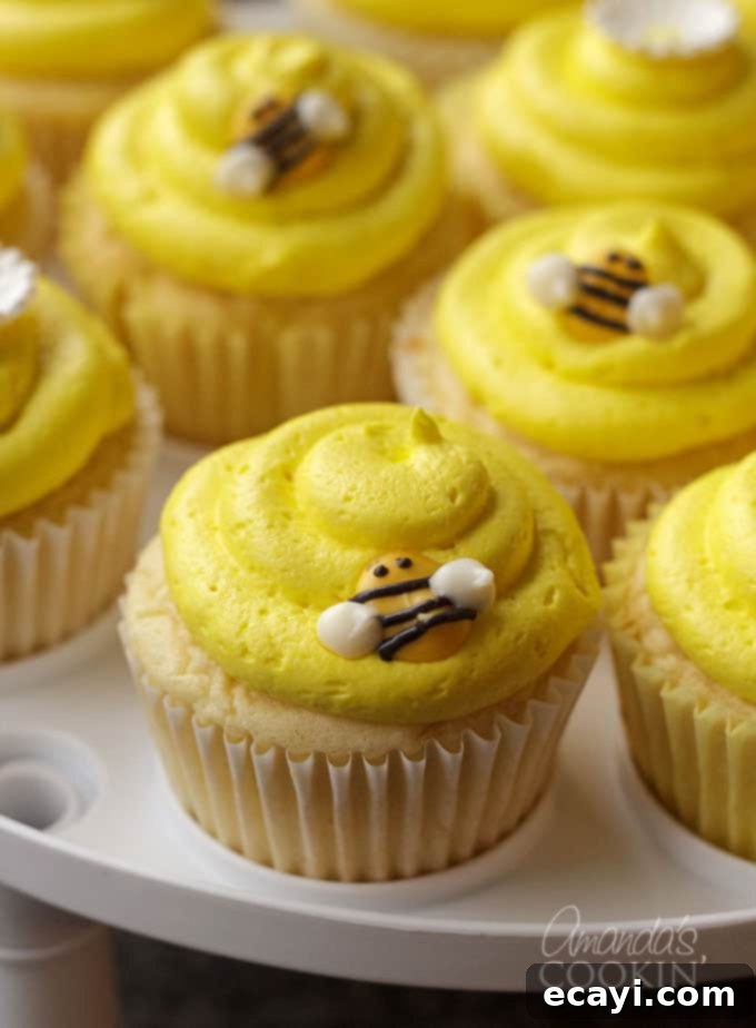 Sweet Honeybee Crowns 3 A closer look at the homemade bee cupcake toppers on frosted cupcakes, showcasing their intricate details