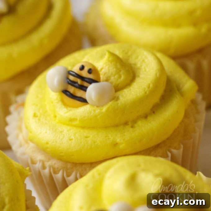 Sweet Honeybee Crowns 10 A close-up of an adorable bee cupcake topper, meticulously crafted at home with candy melts