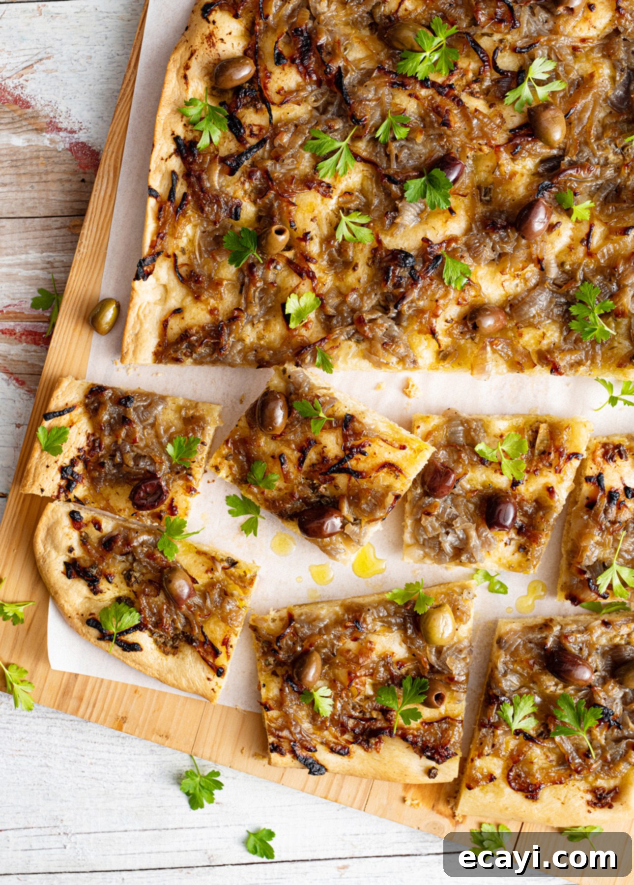 Golden Perfection Pissaladière A Provençal Onion and Anchovy Flatbread 4 A modern take on traditional pissaladière, a type of flatbread from the South of France // FoodNouveau.com