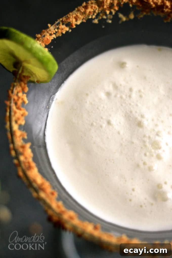 Key West Kiss Martini 11 Key Lime Pie Martini, showcasing its creamy texture and elegant presentation