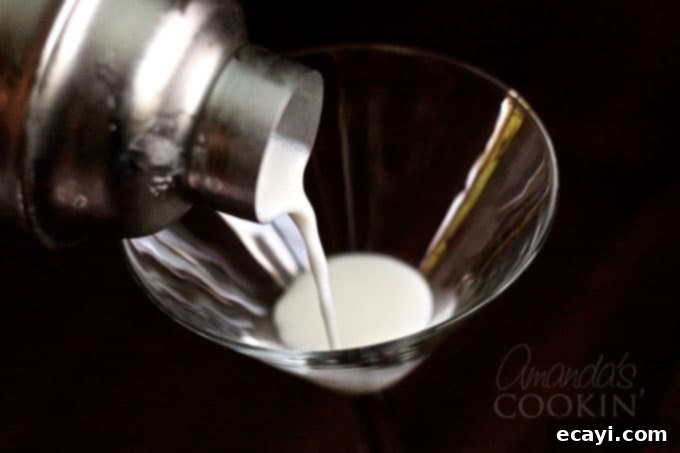 Key West Kiss Martini 13 A martini shaker being used to mix the Key Lime Pie Martini ingredients