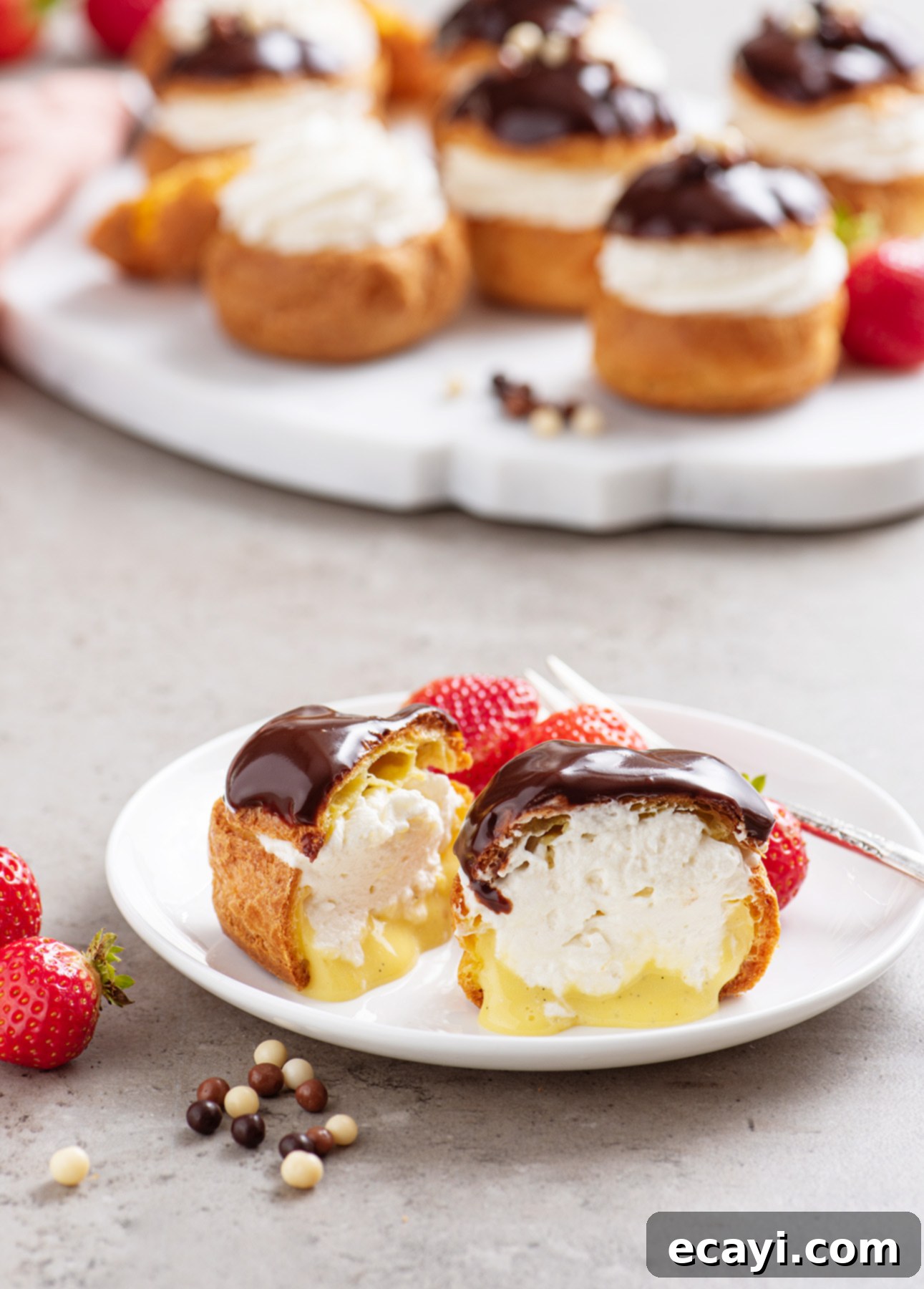 Bake Irresistible Cream Puffs 4 Classic French Cream Puffs with vanilla pastry cream, Chantilly cream, and dark chocolate glaze // FoodNouveau.com