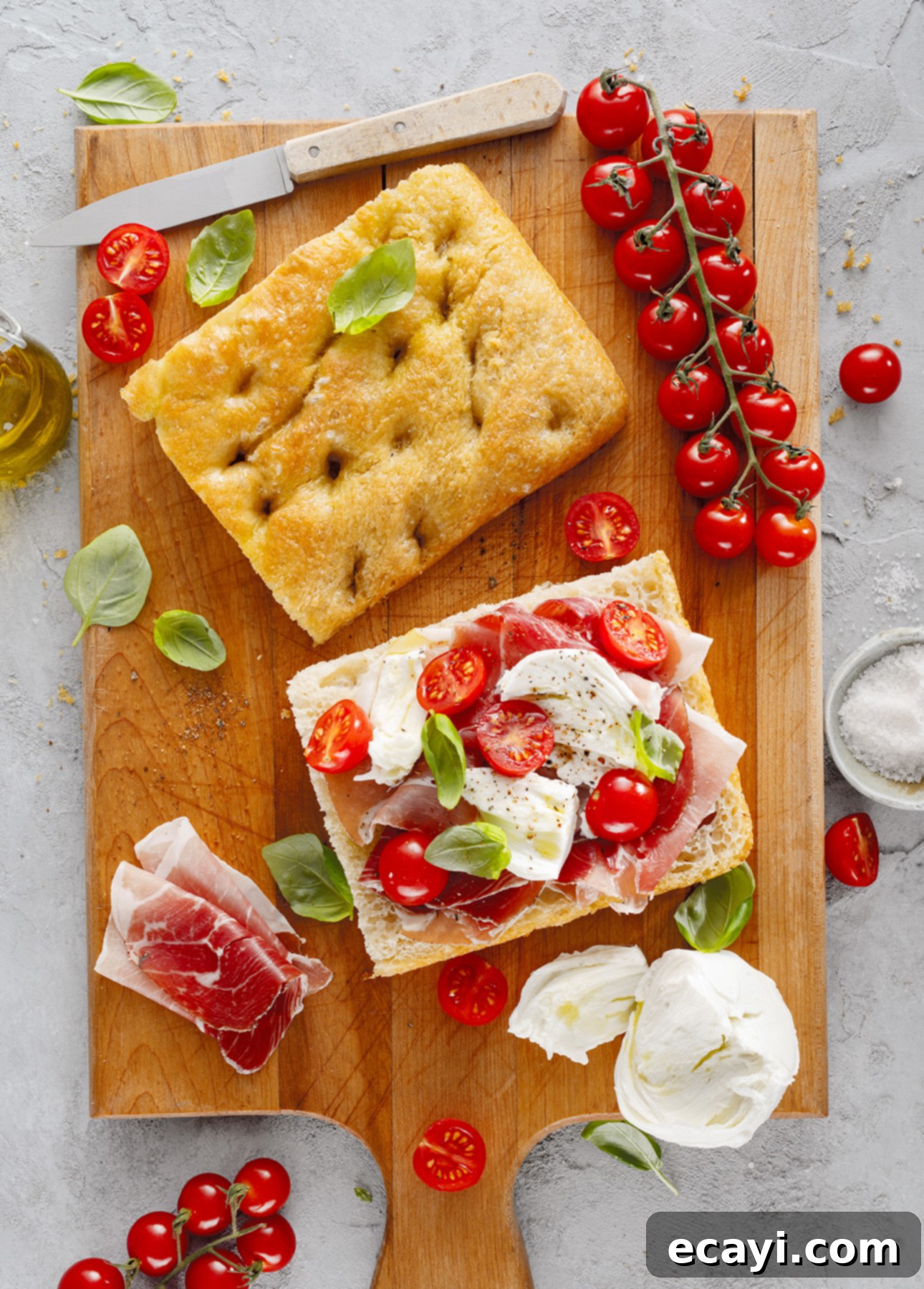 Bake Perfect No-Knead Focaccia Effortlessly 16 Focaccia is the perfect sandwich bread: fill it with mozzarella, prosciutto, tomatoes, and basil for a taste of Italy, at home! // FoodNouveau.com