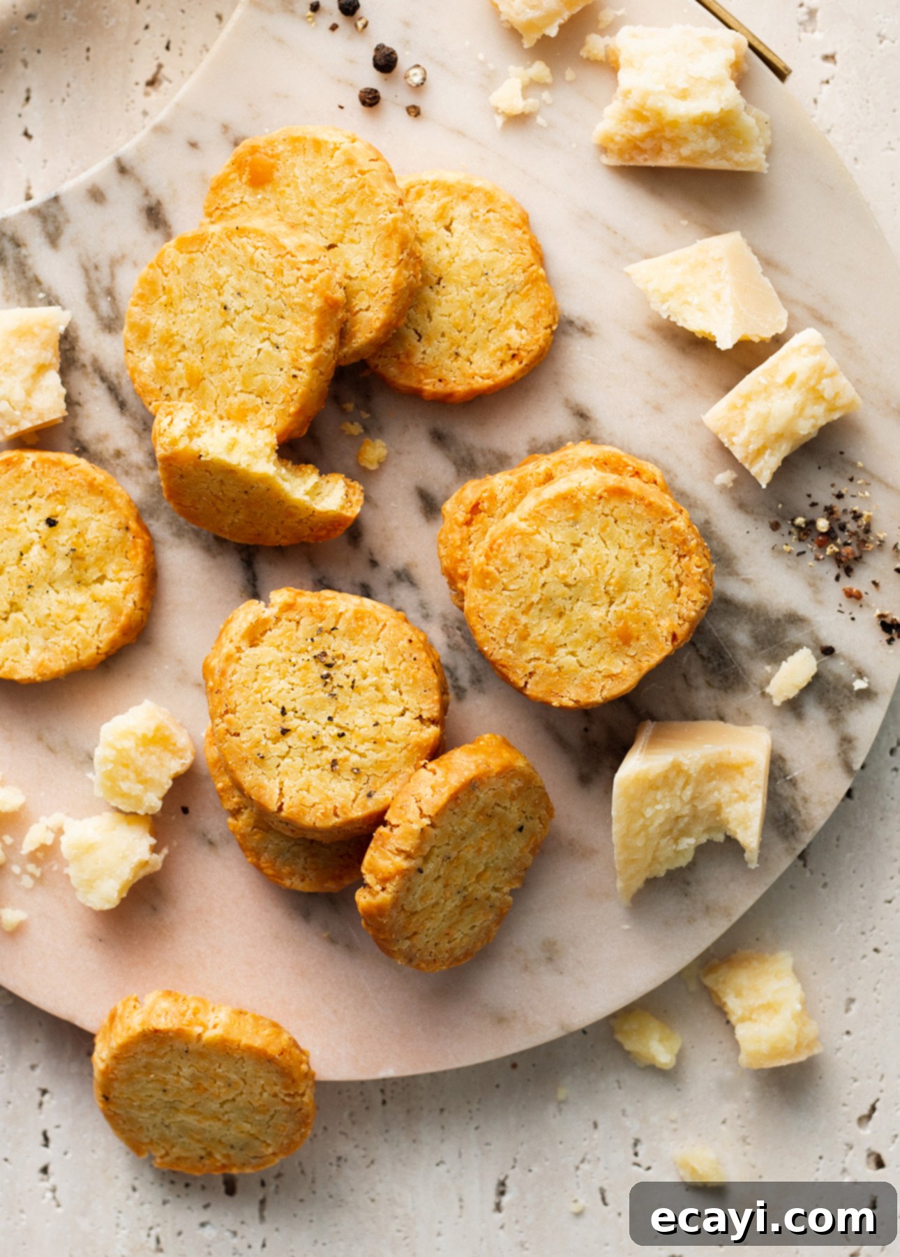 Golden Parmesan Shortbread 3 Parmesan Sablés: easy slice-and-bake savory crackers made with parmesan cheese and black pepper // FoodNouveau.com
