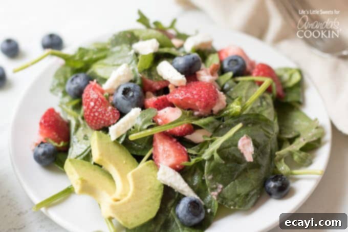 Vibrant Strawberry Salad 4 An artful presentation of Strawberry Salad on a clean white plate, highlighting its fresh and colorful ingredients.