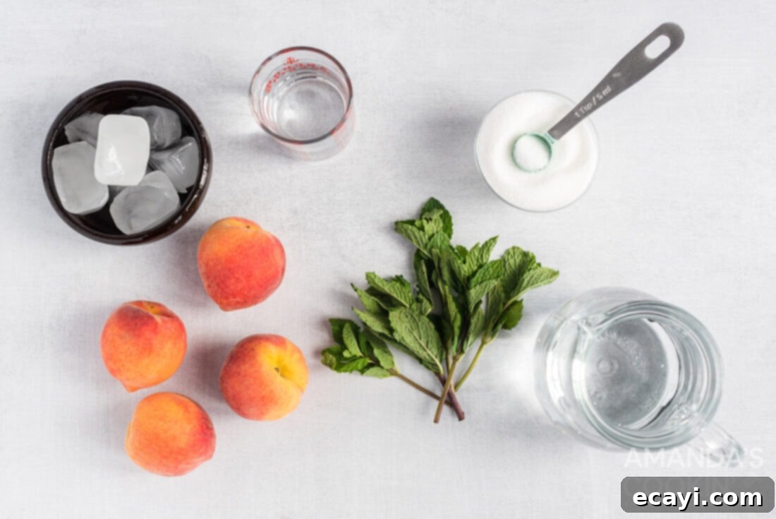 Peach Paradise Mojito 4 A vibrant display of fresh ingredients for peach mojitos, including ripe peaches, a bunch of fresh mint, white rum, and sugar.