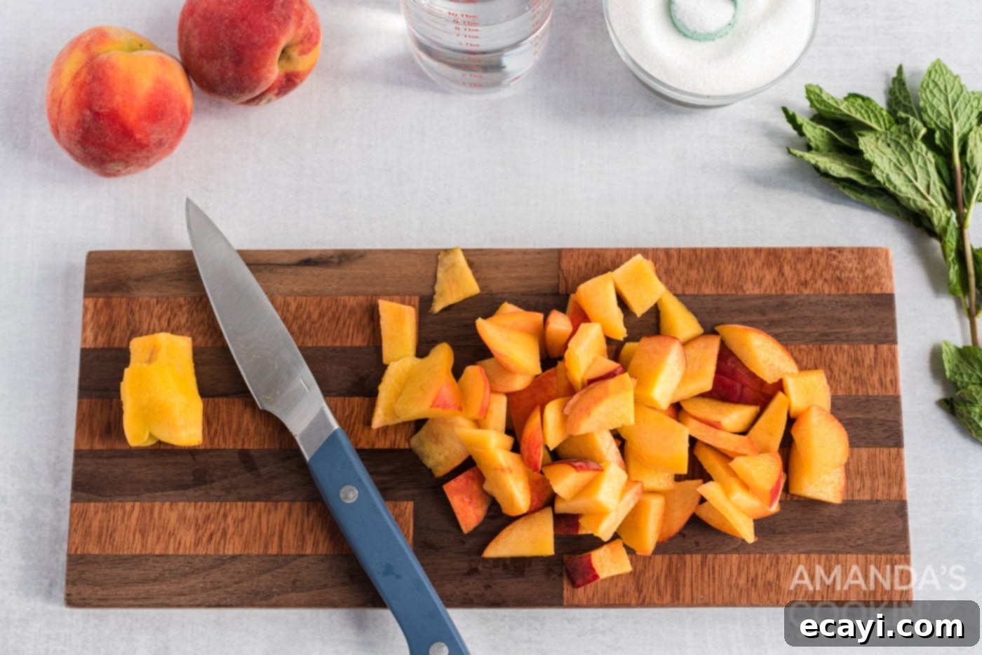 Peach Paradise Mojito 5 sliced peaches on cutting board