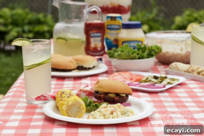 If you're hosting a backyard barbecue, there are definitely some tips and tricks I have learned over the years. From making moist, delicious hamburgers to creating little touches for the best barbecue ever! #BestMealsAtHome #HostedbyHellmanns #Walmart #sponsored A festive backyard barbecue scene with food, drinks, and decor