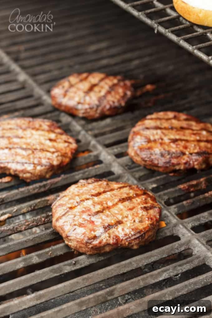 Master Your Backyard Barbecue 6 Burgers on the grill, almost ready to be served