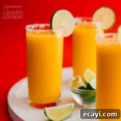 Golden Mango Margarita Freeze 2 3 glasses of mango margarita slush