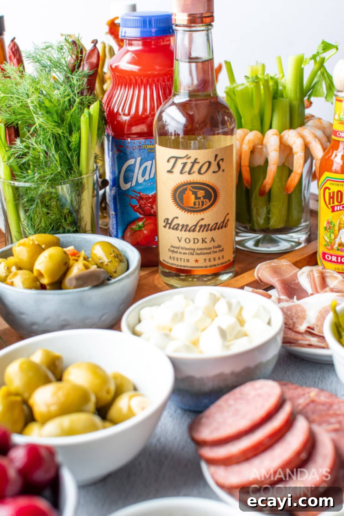 The Curse of Bloody Mary 5 A collection of fresh ingredients laid out for making delicious Bloody Mary cocktails.