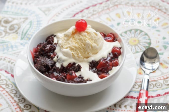 Decadent Slow Cooker Chocolate Cherry Cobbler 4 A full crockpot of bubbly chocolate cherry cobbler, freshly cooked and ready to be served.