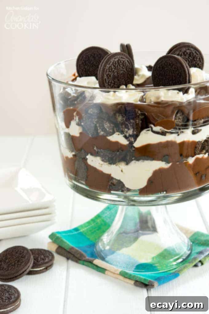 Chocolate Lasagna Trifle Chocolate Lasagna Trifle- chocolate pudding, oreo cookies and whipped topping in a trifle bowl.
