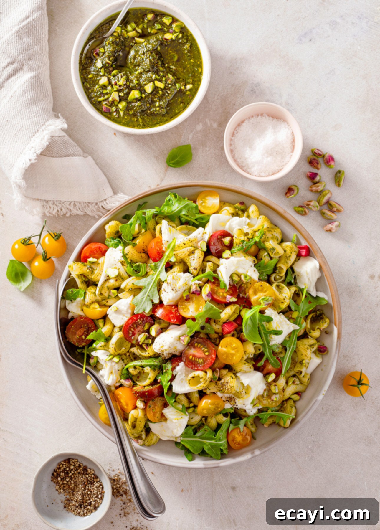 Pistachio Kissed Caprese Pasta Salad 2 Caprese Pasta Salad with Pistachio Pesto, showcasing a delightful and vibrant culinary creation.