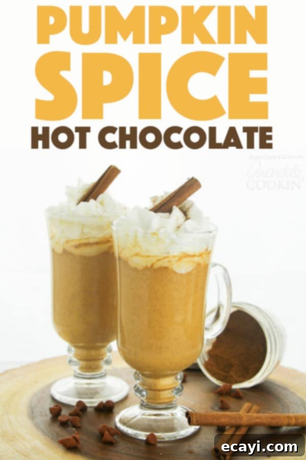 Our Pumpkin Spice Hot Chocolate made with real chocolate and milk is a creamy and delicious treat perfect for warming up on a brisk fall day. #pumpkin #pumpkinspice #hotchocolate #fall #falldrinks #drinkrecipes #thanksgiving Pumpkin Spice Hot Chocolate Recipe