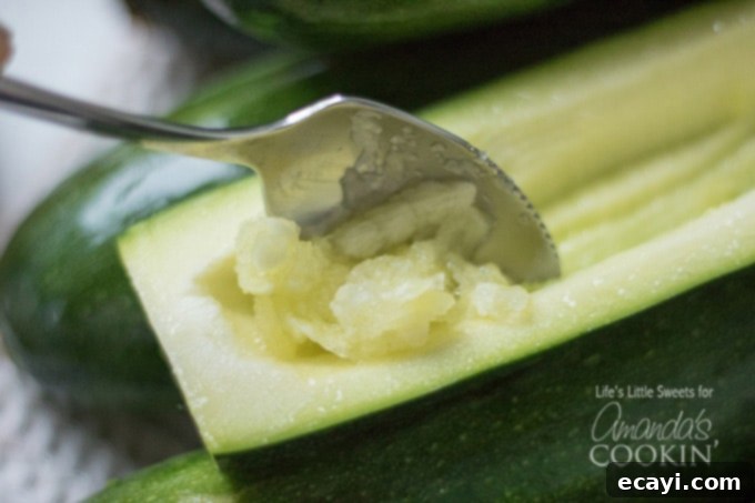Zucchini Pockets 4 Scooping out the pulp from zucchini halves