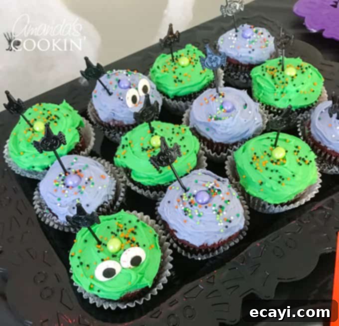 If you need Halloween food ideas for your Halloween party, be sure to check out all these sweet, savory and beverage ideas! Something for everyone. #halloweenrecipes #halloweenfoodideas #halloweenfood #halloweentreats #halloweenpartyfood #mummycookies #mozarellaeyeballs #spidertacodip #spidercookies #ricekrispypumpkins #ricekrispymonsters #dipinapumpkin #halloweenparty halloween cupcakes