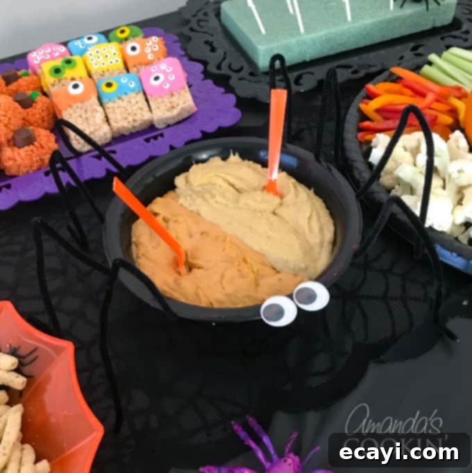 Ghoulish Grub for Your Halloween Bash 2 hummus in spider bowl