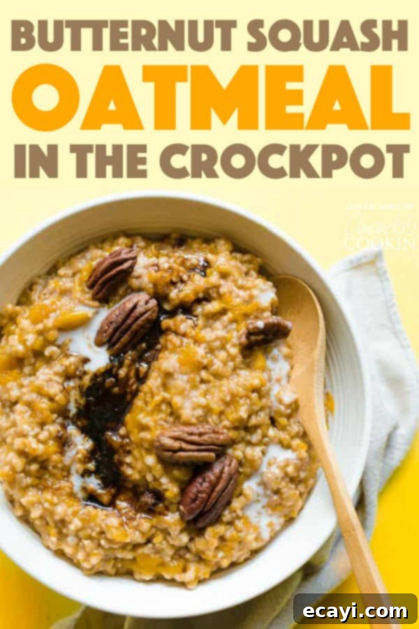 This crockpot butternut squash oatmeal will fill your house with the delicious aroma of autumn and will cook into creamy perfection while you sleep! #butternutsquash #oatmeal #breakfastrecipes #easybreakfast #crockpotrecipes #slowcooker #breakfast #crockpot #fallrecipes Crockpot Butternut Squash Oatmeal in a slow cooker, ready to be served for a cozy fall breakfast