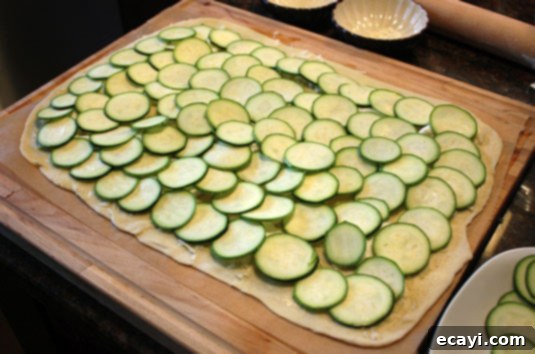 Recreate Romes Legendary Forno Campo de Fiori Pizza From Scratch 12 Place the thin zucchini slices over the pizza in an overlapping pattern for even cooking and presentation.