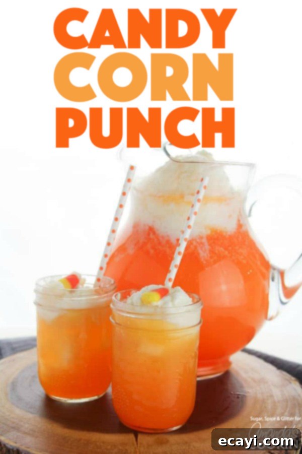 A Candy Corn Punch is perfect for fall get-togethers with friends or a Thanksgiving gathering. It's non alcoholic too, so the kids can enjoy it as well! #candycorn #thanksgiving #falldrinks #partydrinks #thanksgivingdrinks #creamsicle #mango #icecream A Pinterest-optimized image of Candy Corn Punch, highlighting its festive appeal for fall parties and Thanksgiving