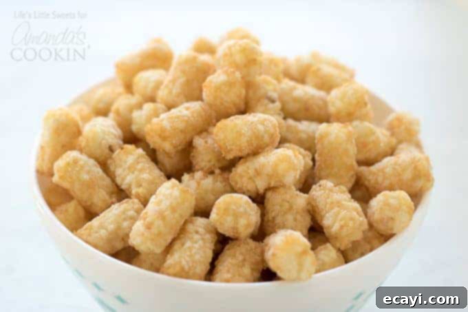 Chicken Pot Pie Tater Tot Casserole tater tots Tater tots for Chicken Pot Pie Tater Tot Casserole in a bowl