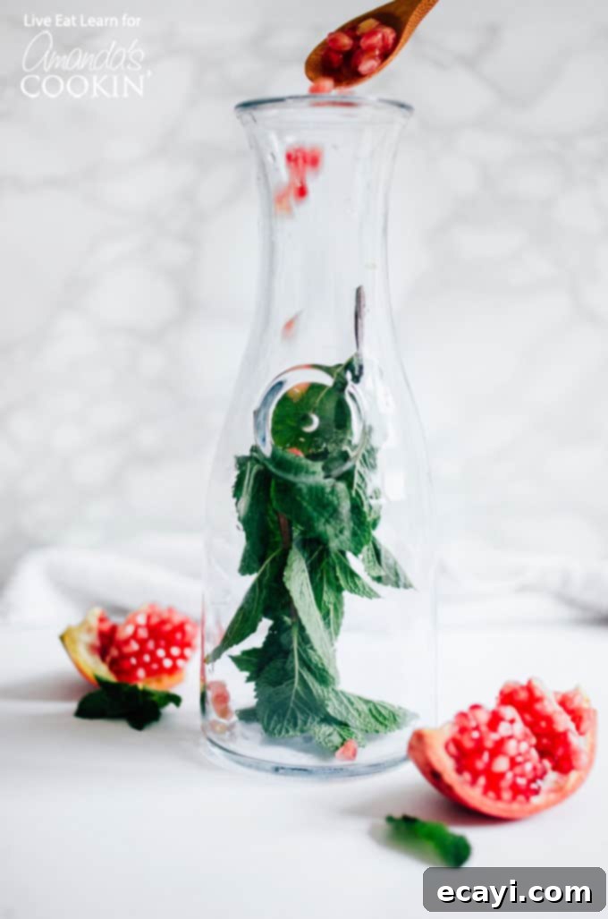 Fresh Mint for Your Pomegranate Detox Water Close-up of fresh mint sprigs, a key ingredient in the refreshing Holiday Detox Drink, ready for muddling.