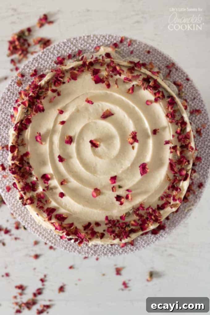 This red velvet cake is perfect for birthday parties, tea parties, or any type of gathering. Red velvet cake overhead shot with edible rose petals