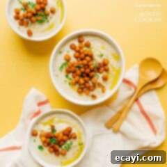Slow Cooker Velvety Cauliflower Bliss 7 three bowls of cauliflower soup with chickpea garnish