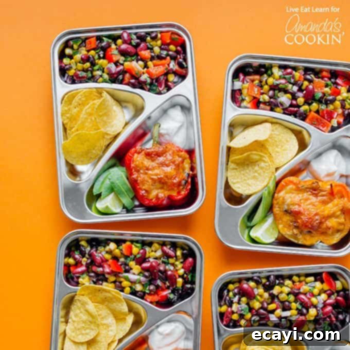 These easy to prepare stuffed pepper meal prep boxes are full of flavor and perfect for getting ahead of the game with your meals for the week! #mealprep #mealprepboxes #vegetarianmealprep #quinoa #stuffedpeppers #beansalad #lunch #dinner Individual portioned lunches in reusable silver containers