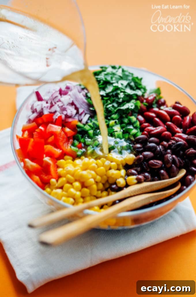 These easy to prepare stuffed pepper meal prep boxes are full of flavor and perfect for getting ahead of the game with your meals for the week! #mealprep #mealprepboxes #vegetarianmealprep #quinoa #stuffedpeppers #beansalad #lunch #dinner Ingredients for making the bean salad and stuffed peppers for meal prep