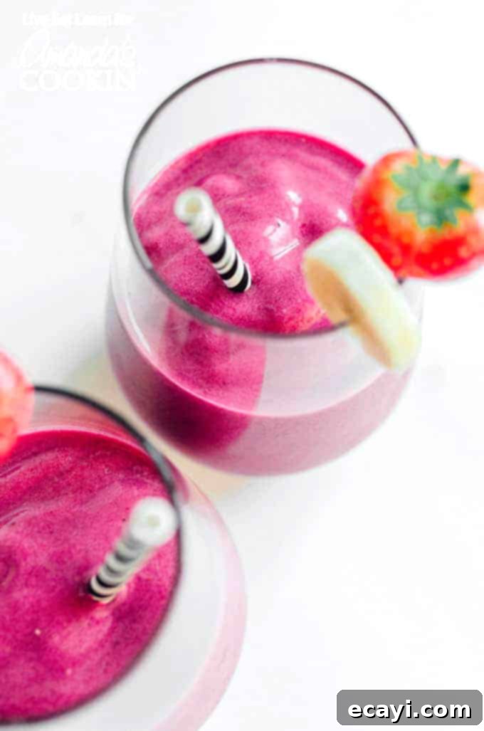 Healthy Strawberry Beet Smoothie with antioxidant-rich beets, strawberries, and banana, ideal for breakfast or an energizing snack Creamy Strawberry Beet Smoothie in a glass, perfect for a healthy breakfast or snack