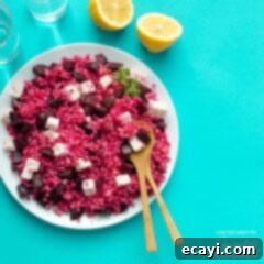 Jeweled Couscous with Ruby Beet & Feta 2 Pearl Couscous Salad with Feta and Beets, beautifully presented in a recipe card format.