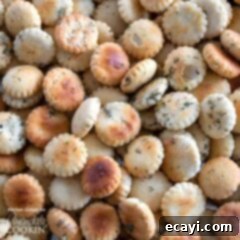 Zesty Ranch Oyster Bites 2 Close-up of crispy ranch seasoned oyster crackers, fresh out of the oven or slow cooker